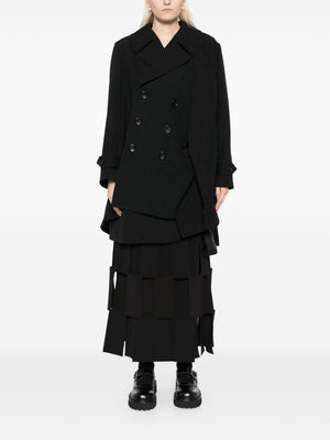 Comme Des Garcons Complete with asymmetrical sleeves