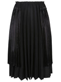 تنورة ميدي بكسرات من تصميم Comme Des Garcons