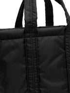 حقيبة عملية من تصميم Comme Des Garcons