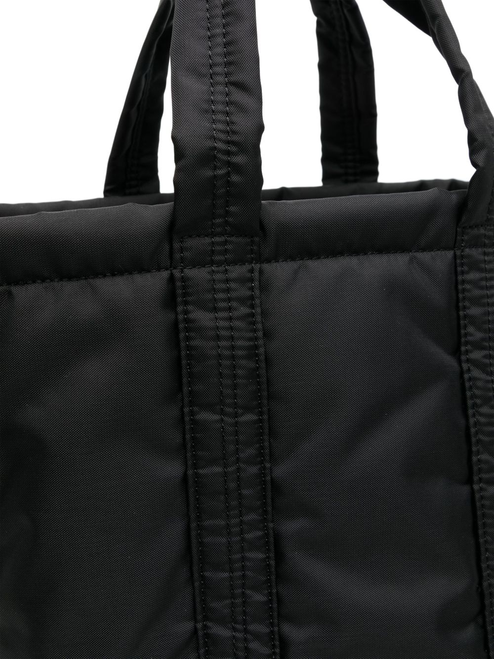 حقيبة عملية من تصميم Comme Des Garcons