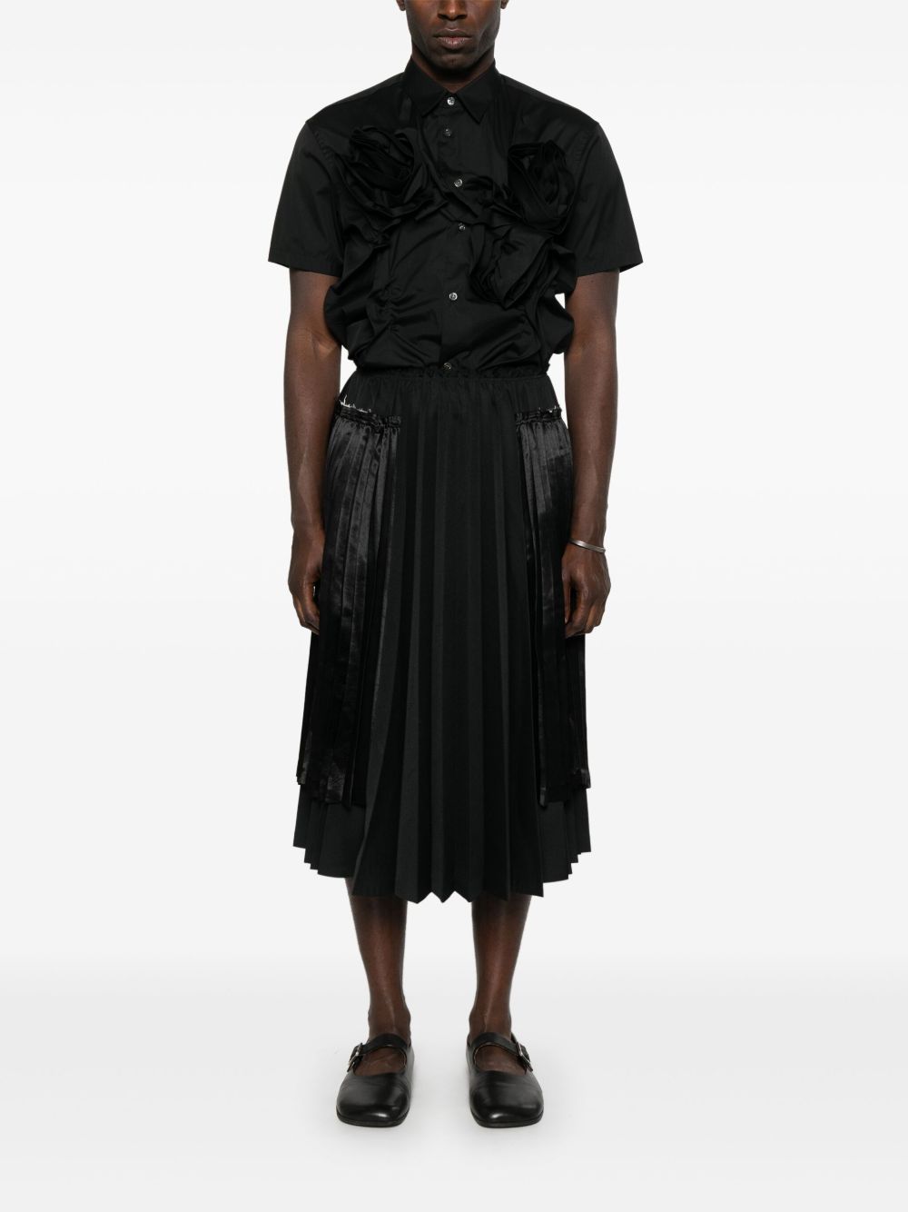 تنورة ميدي بكسرات من تصميم Comme Des Garcons