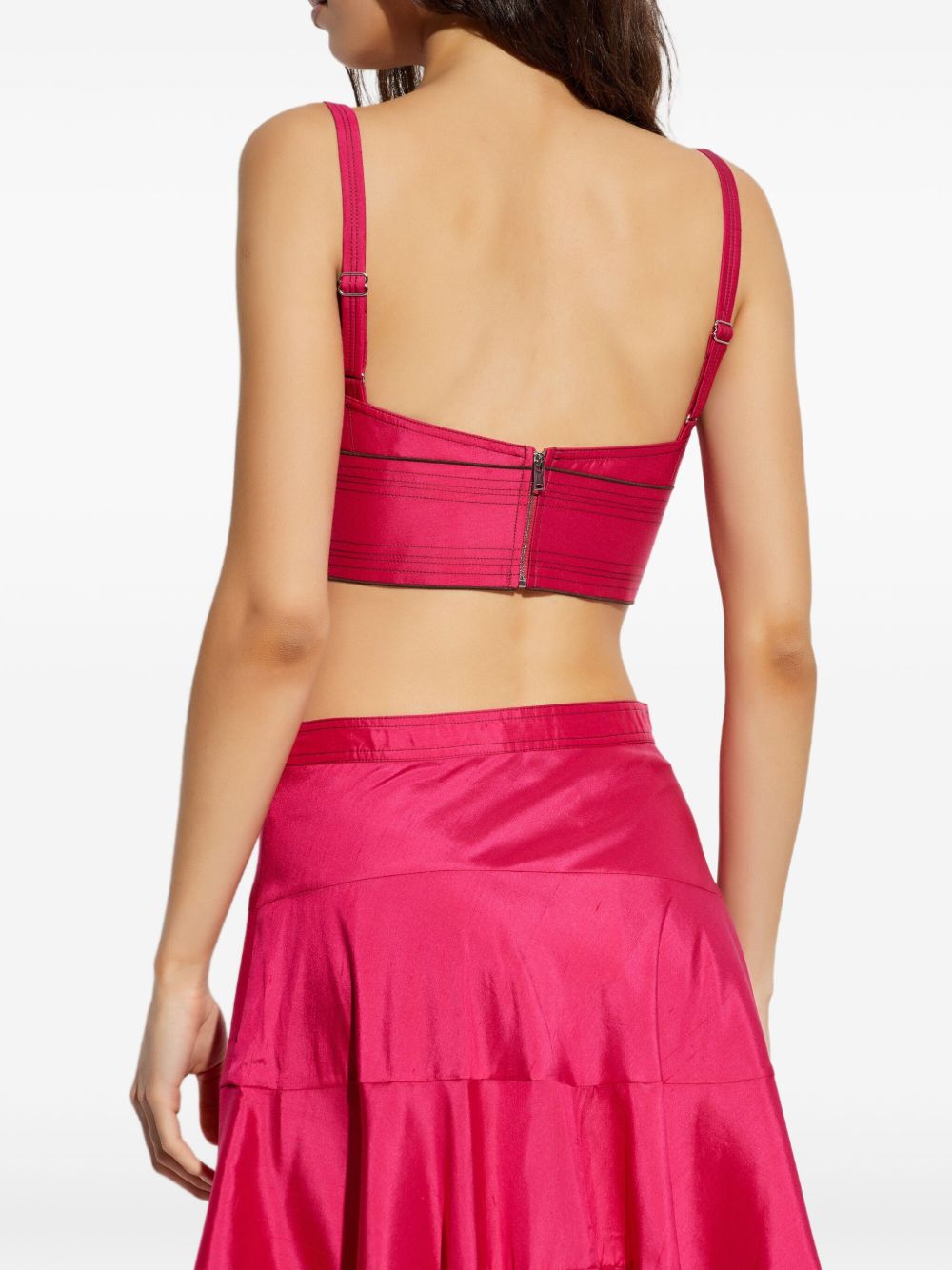 بلوزة توري بورش باللون الفوشيا