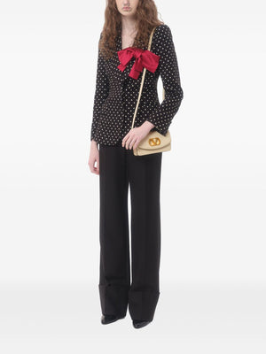 Valentino Garavani Vain Clutch in Shiny Calfskin