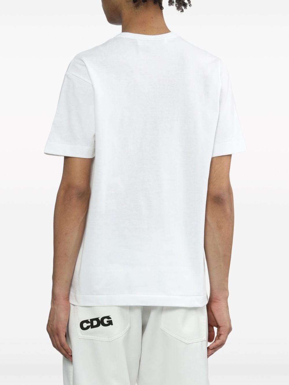 قمصان وقمصان بولو بيضاء من Comme des Garcons