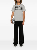 قمصان Comme des Garcons وقمصان بولو رمادية