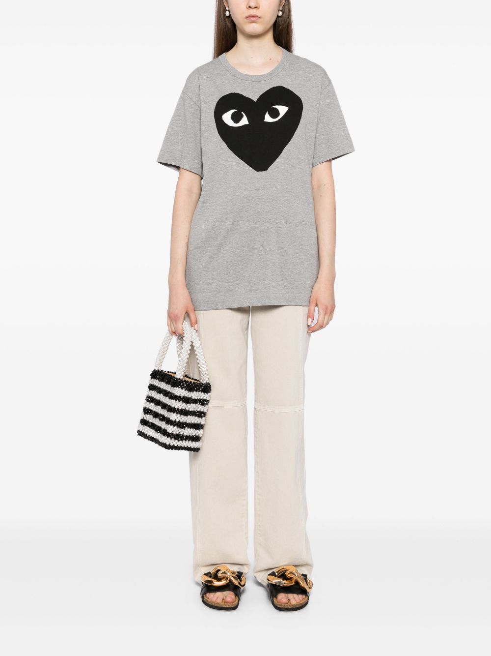 قمصان Comme des Garcons وقمصان بولو رمادية