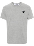 قمصان Comme des Garcons وقمصان بولو رمادية