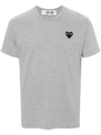 قمصان Comme des Garcons وقمصان بولو رمادية
