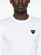 قمصان وقمصان بولو بيضاء من Comme des Garcons