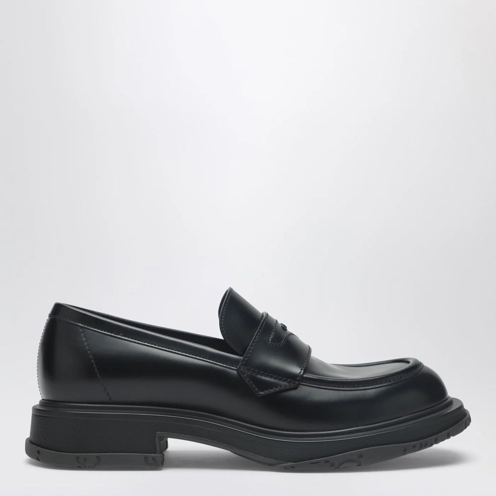 GUCCI Black leather loafer with logo