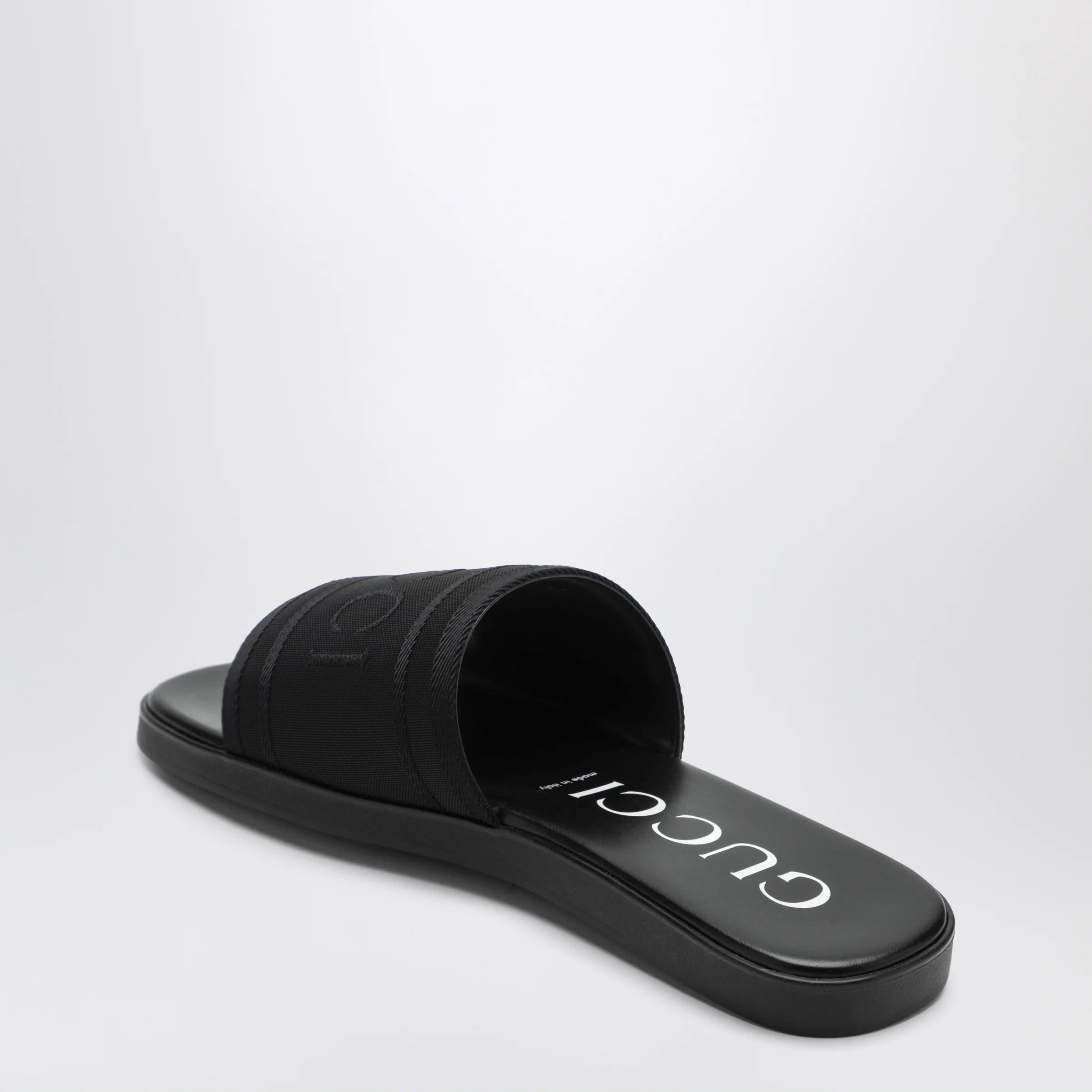 GUCCI Black jacquard fabric slides