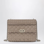 Valentino Garavani Medium Rockstud Spike bag in powder pink nappa leather