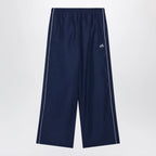 Balenciaga Bodies track pants in dark navy poplin