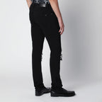 AMIRI Ripped skinny cotton jeans in black