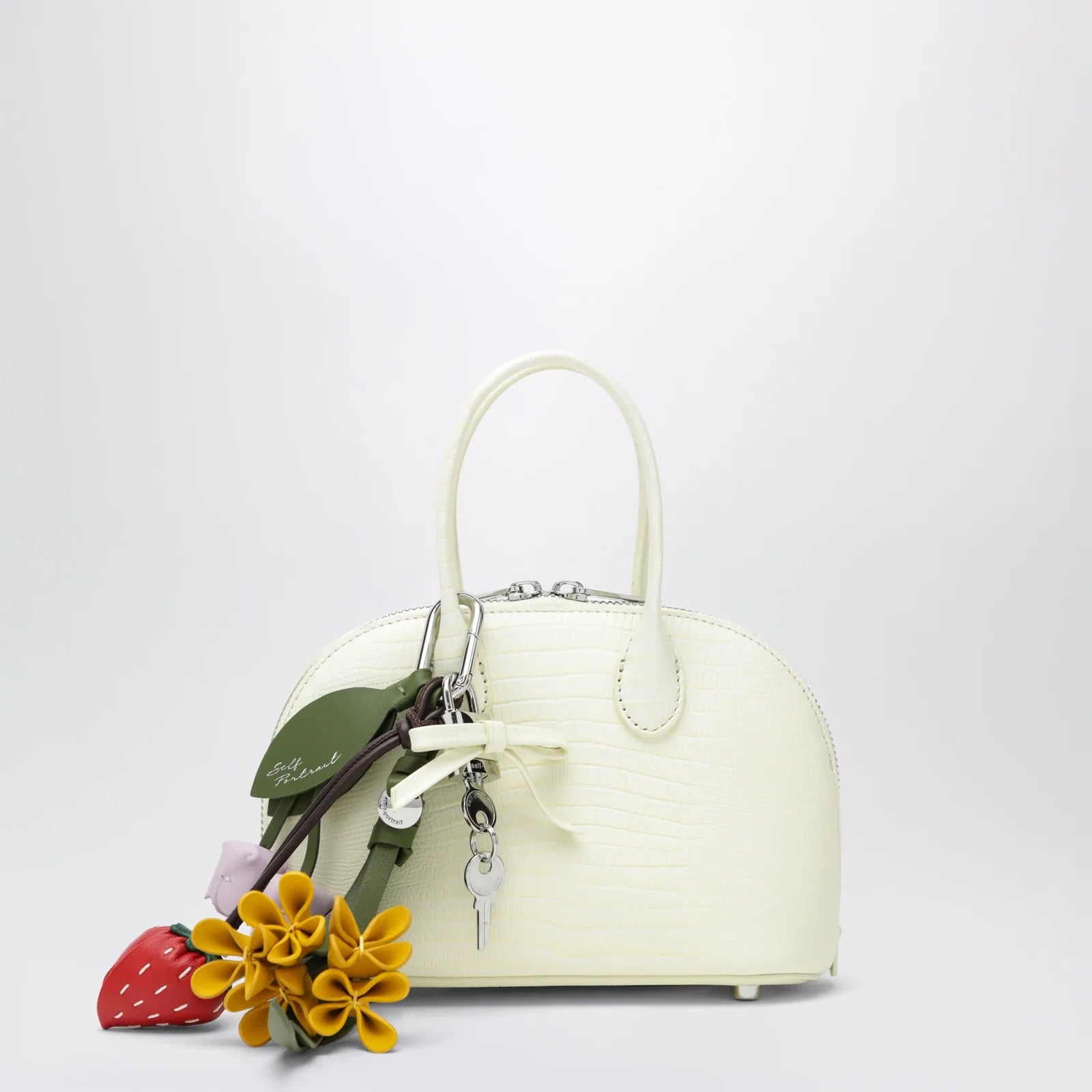 Self-Portrait Mini embossed leather bowling bag in yellow