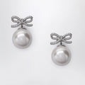 Self-Portrait Crystal bow and back pearl earrings in silver
