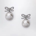 Self-Portrait Crystal bow and back pearl earrings in silver
