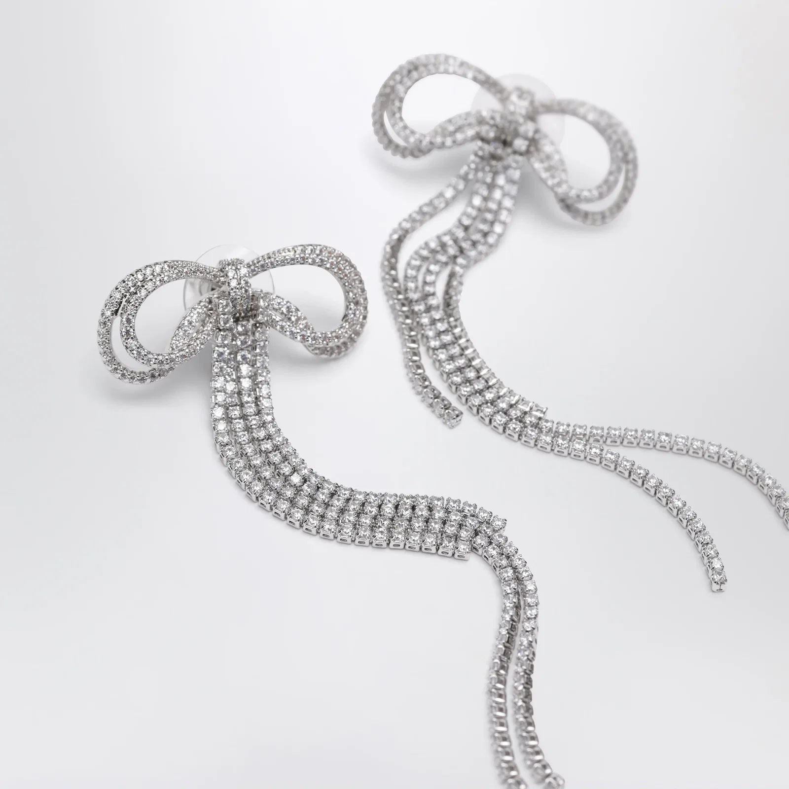 Self-Portrait Double crystal bow drop earrings in silver-plated brass