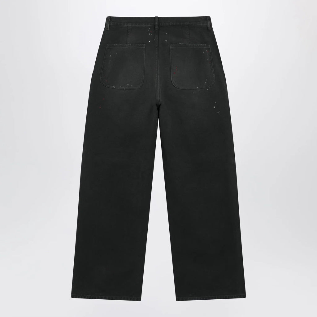 Maison Margiela Double-dyed work trousers in black cotton with spots
