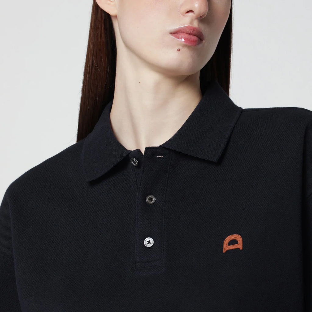 Dunst Navy blue polo shirt with leather logo